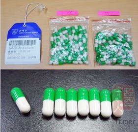 韩方截获的“人肉胶囊”。